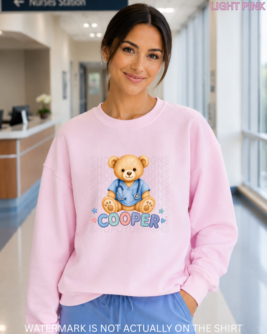 Cooper Cute Teddy Bear Healthcare Worker T-Shirt, Crewneck Sweatshirt & Hoodie